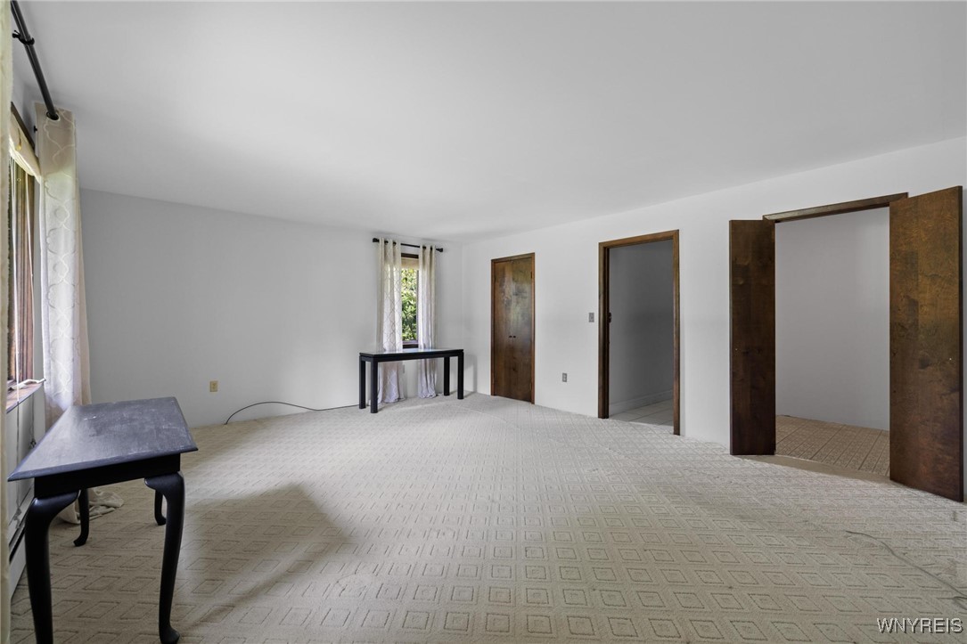 1575 Overhead Road Derby, NY 14047 - Photo 17 of 50 Primary bedroom with walk in closet