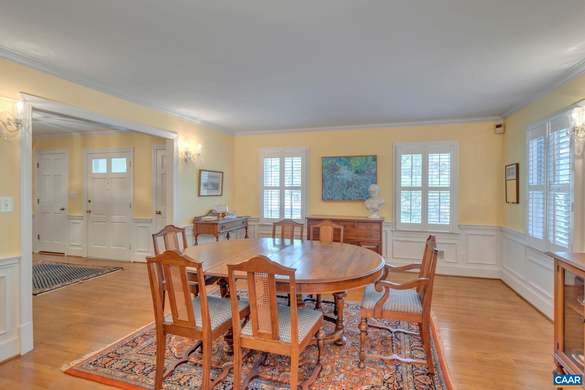 1440 Grove Road Charlottesville, VA 22901 - Photo 11 of 72 a view of a dining room with furniture and wooden floor