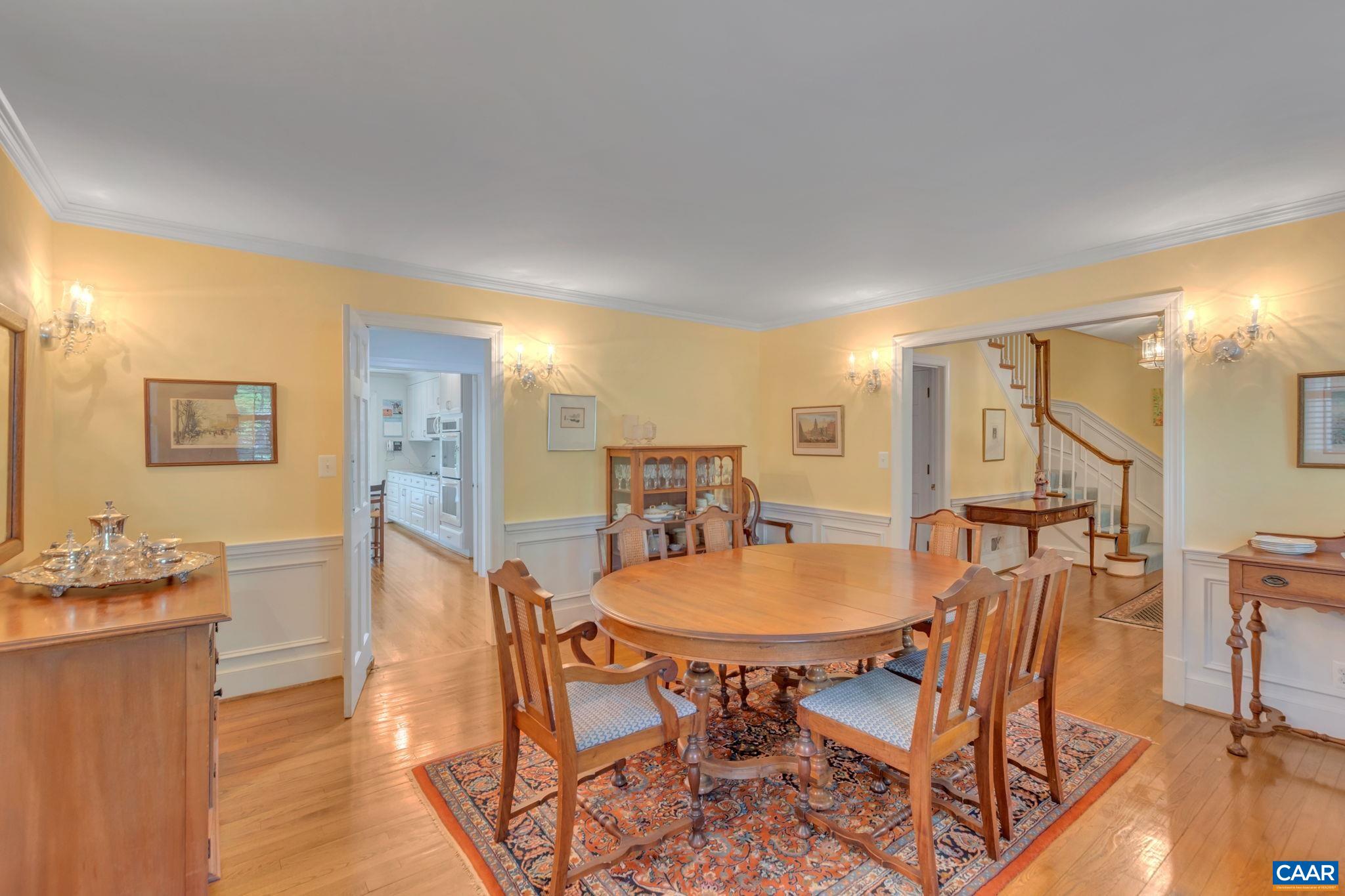 1440 Grove Road Charlottesville, VA 22901 - Photo 12 of 72 a view of a dining room with furniture and wooden floor
