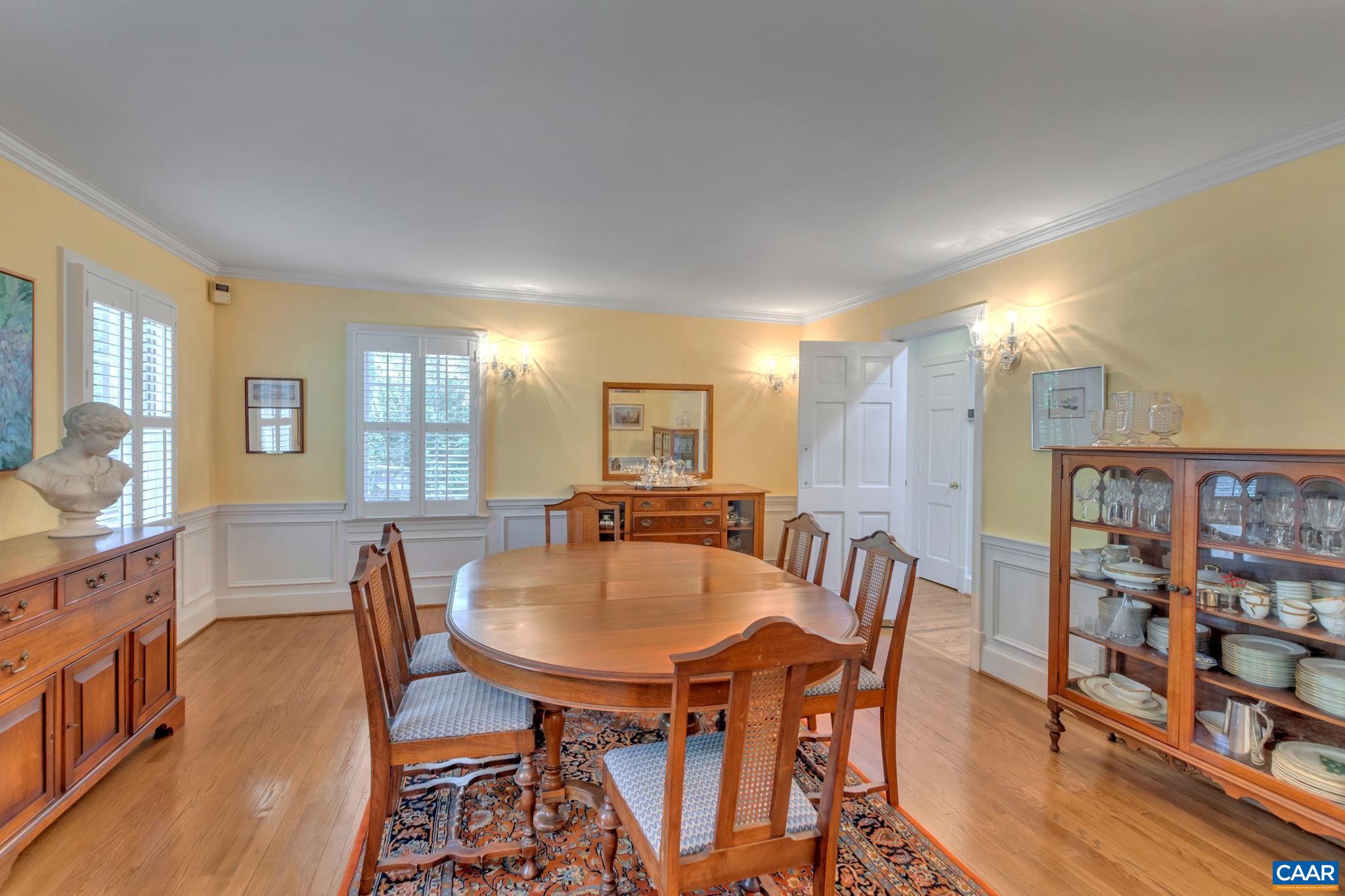 1440 Grove Road Charlottesville, VA 22901 - Photo 13 of 72 a dining room with furniture and wooden floor
