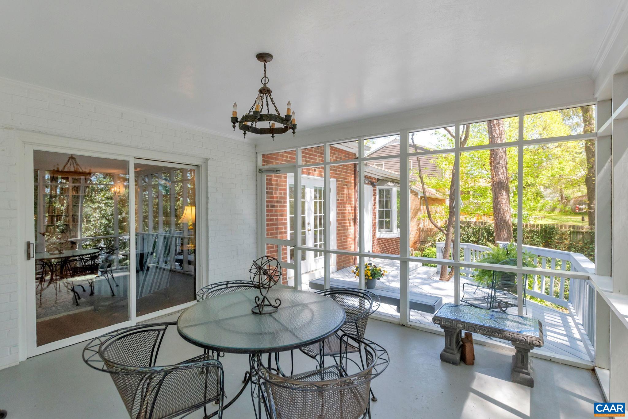 1440 Grove Road Charlottesville, VA 22901 - Photo 27 of 72 a view of a livingroom with furniture and large windows