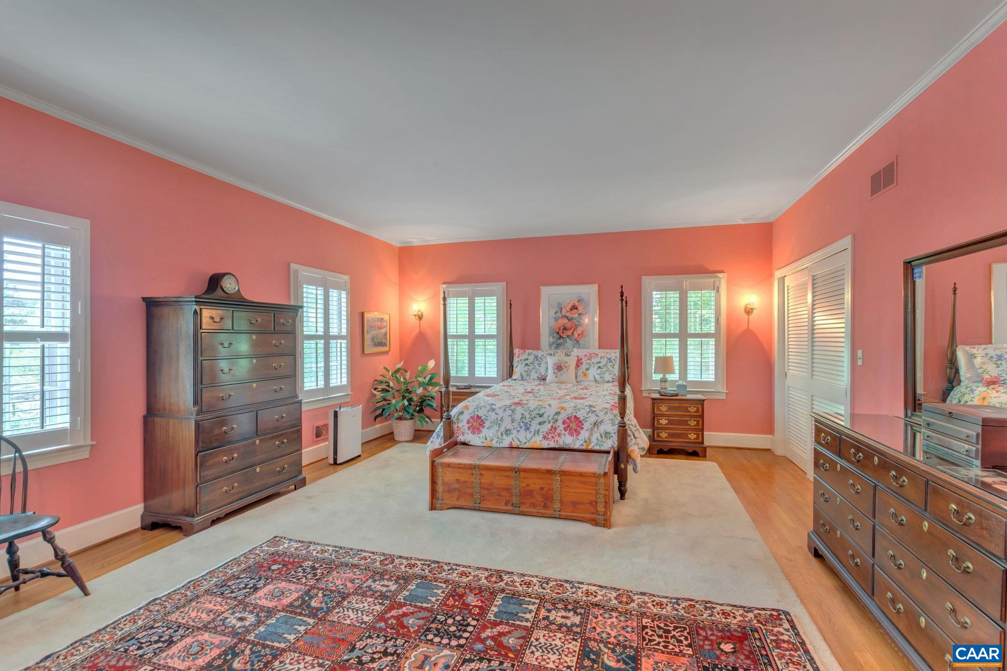 1440 Grove Road Charlottesville, VA 22901 - Photo 29 of 72 a living room with furniture rug and wooden floor
