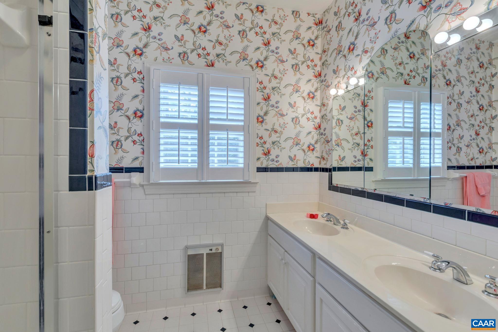 1440 Grove Road Charlottesville, VA 22901 - Photo 30 of 72 a bathroom with a sink and a bathtub