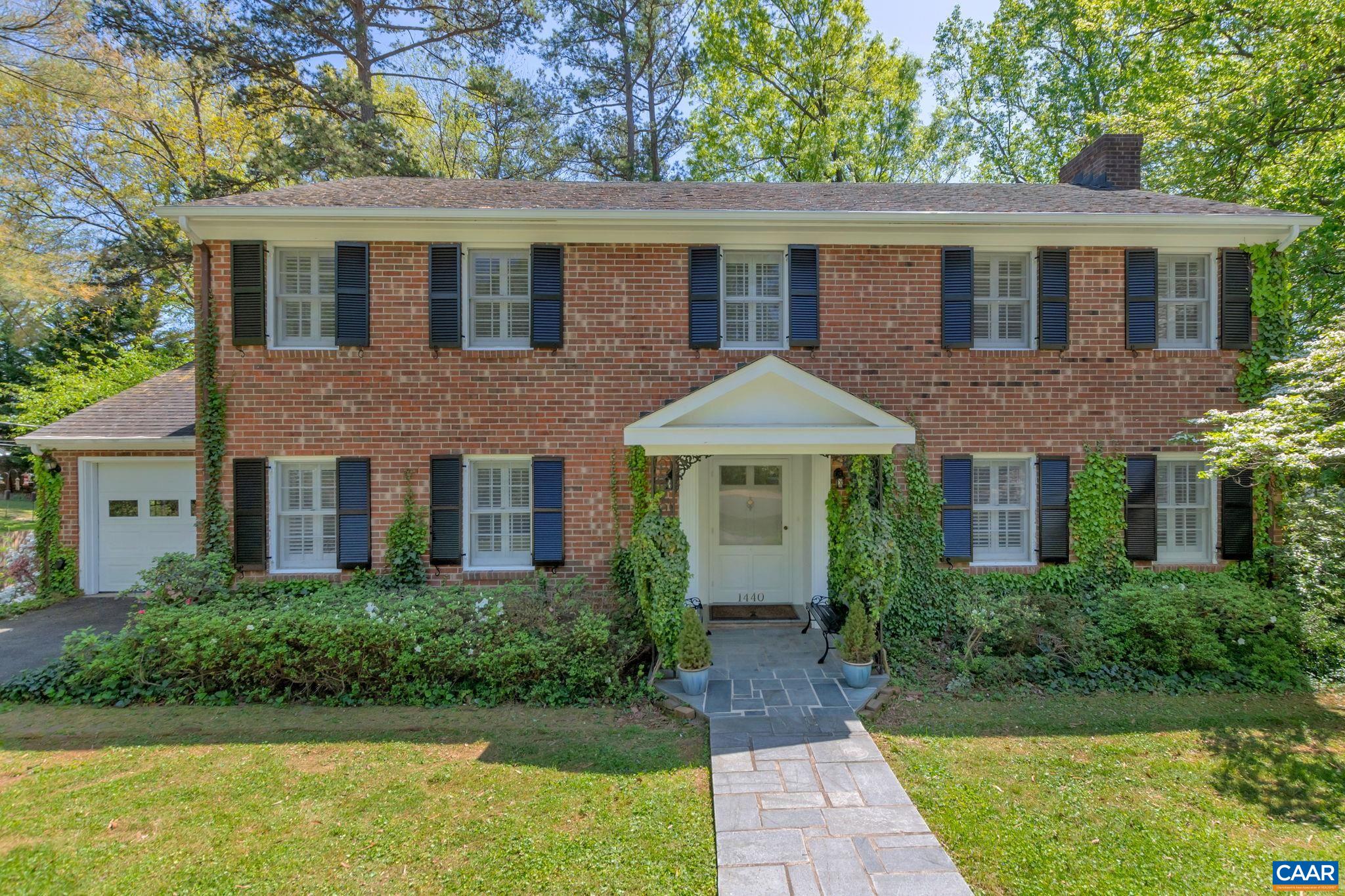 1440 Grove Road Charlottesville, VA 22901 - Photo 3 of 72 a front view of a house with garden