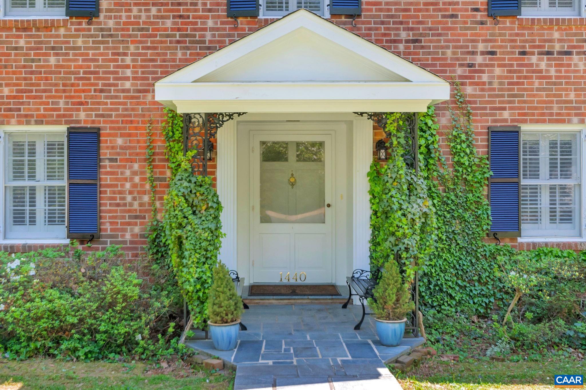 1440 Grove Road Charlottesville, VA 22901 - Photo 4 of 72 a front view of a house with a yard