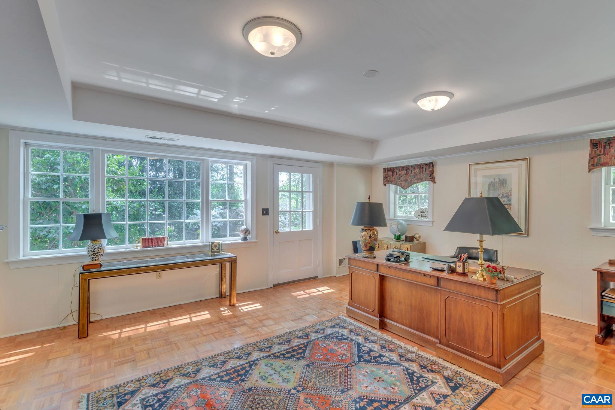 1440 Grove Road Charlottesville, VA 22901 - Photo 44 of 72 a workspace with furniture and a window