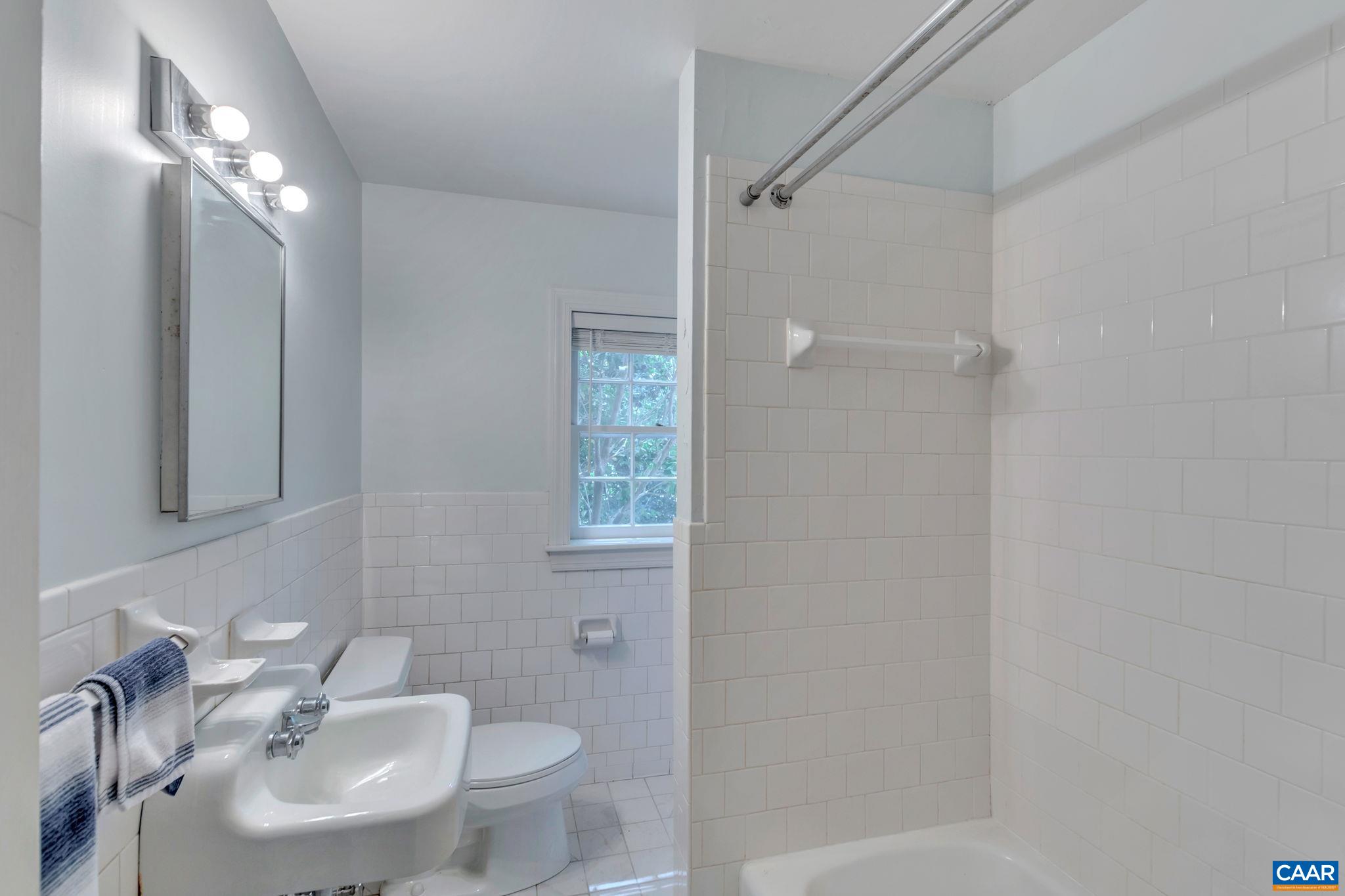 1440 Grove Road Charlottesville, VA 22901 - Photo 51 of 72 a bathroom with a sink toilet and shower
