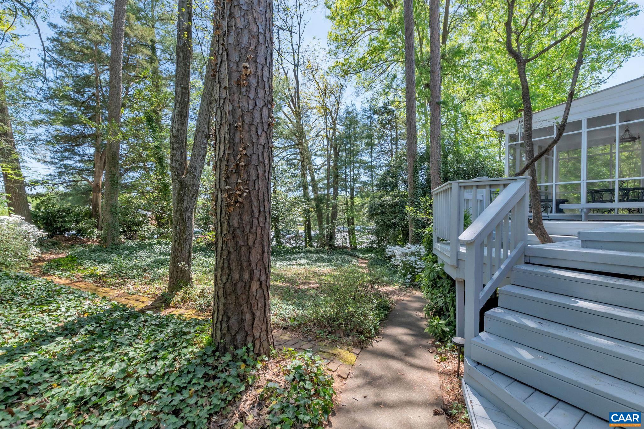 1440 Grove Road Charlottesville, VA 22901 - Photo 55 of 72 a view of a yard with large trees