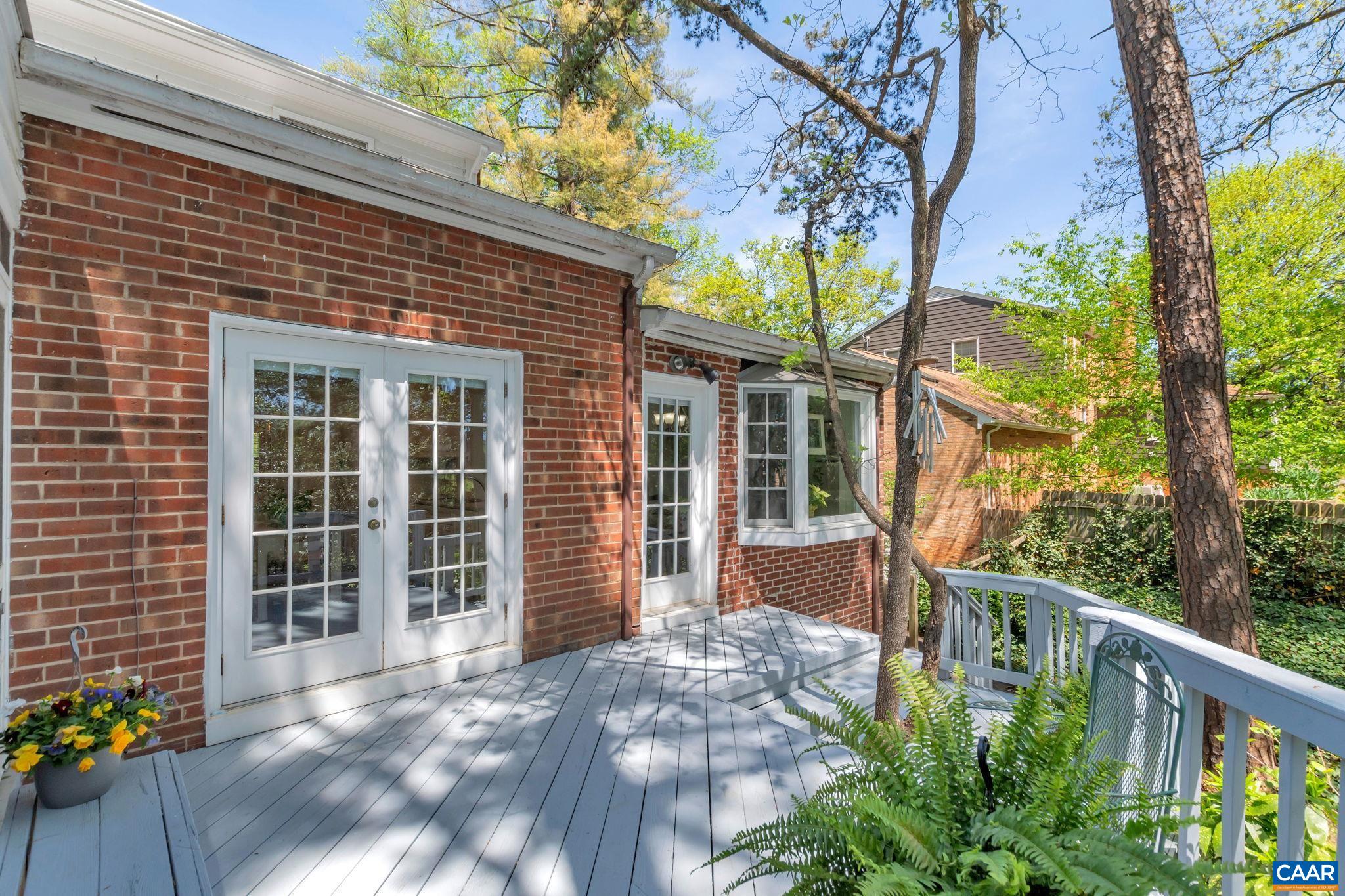 1440 Grove Road Charlottesville, VA 22901 - Photo 61 of 72 a view of a house with a flower garden