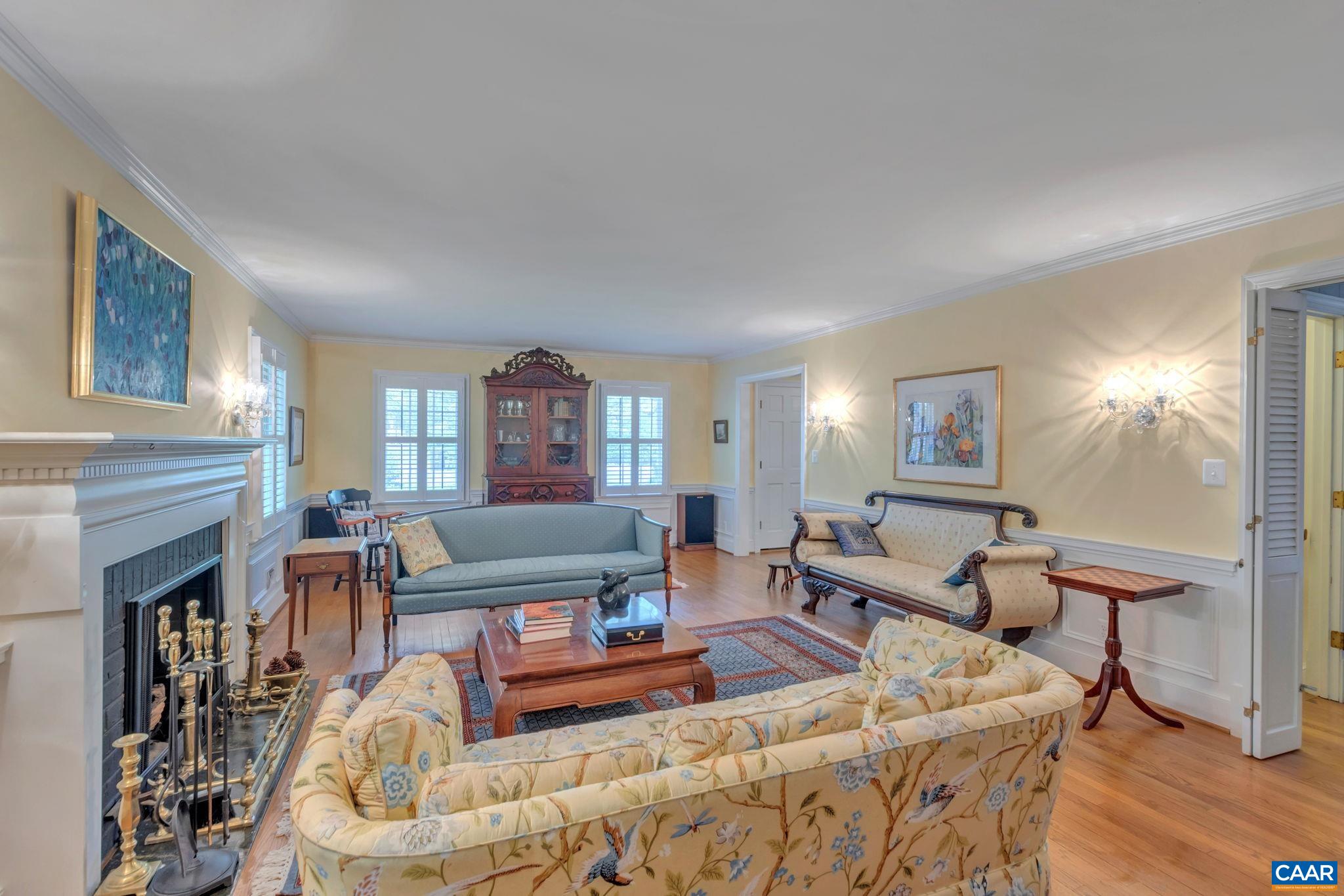 1440 Grove Road Charlottesville, VA 22901 - Photo 8 of 72 a living room with furniture a fireplace and a window