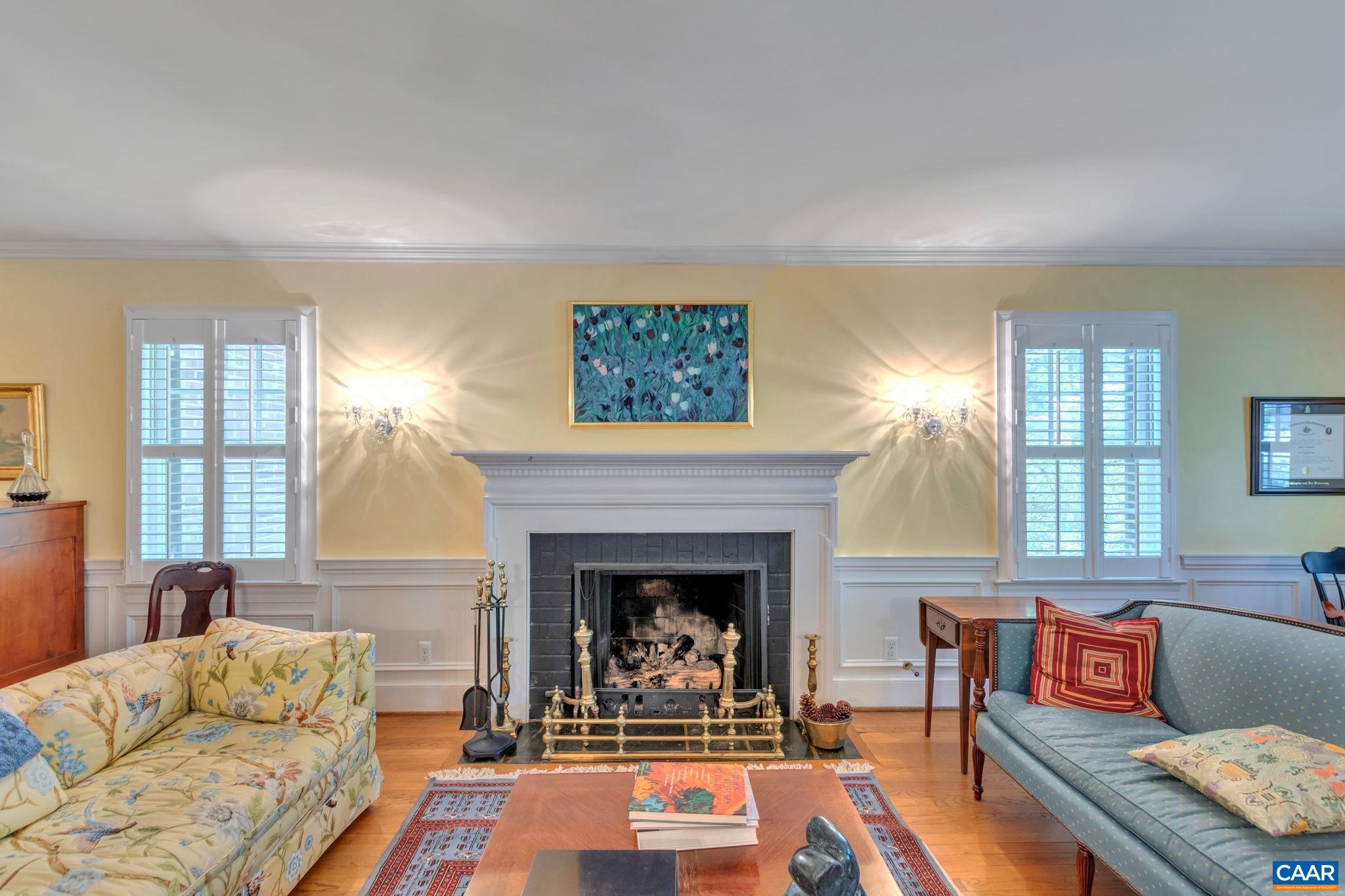 1440 Grove Road Charlottesville, VA 22901 - Photo 9 of 72 a living room with furniture and a fireplace