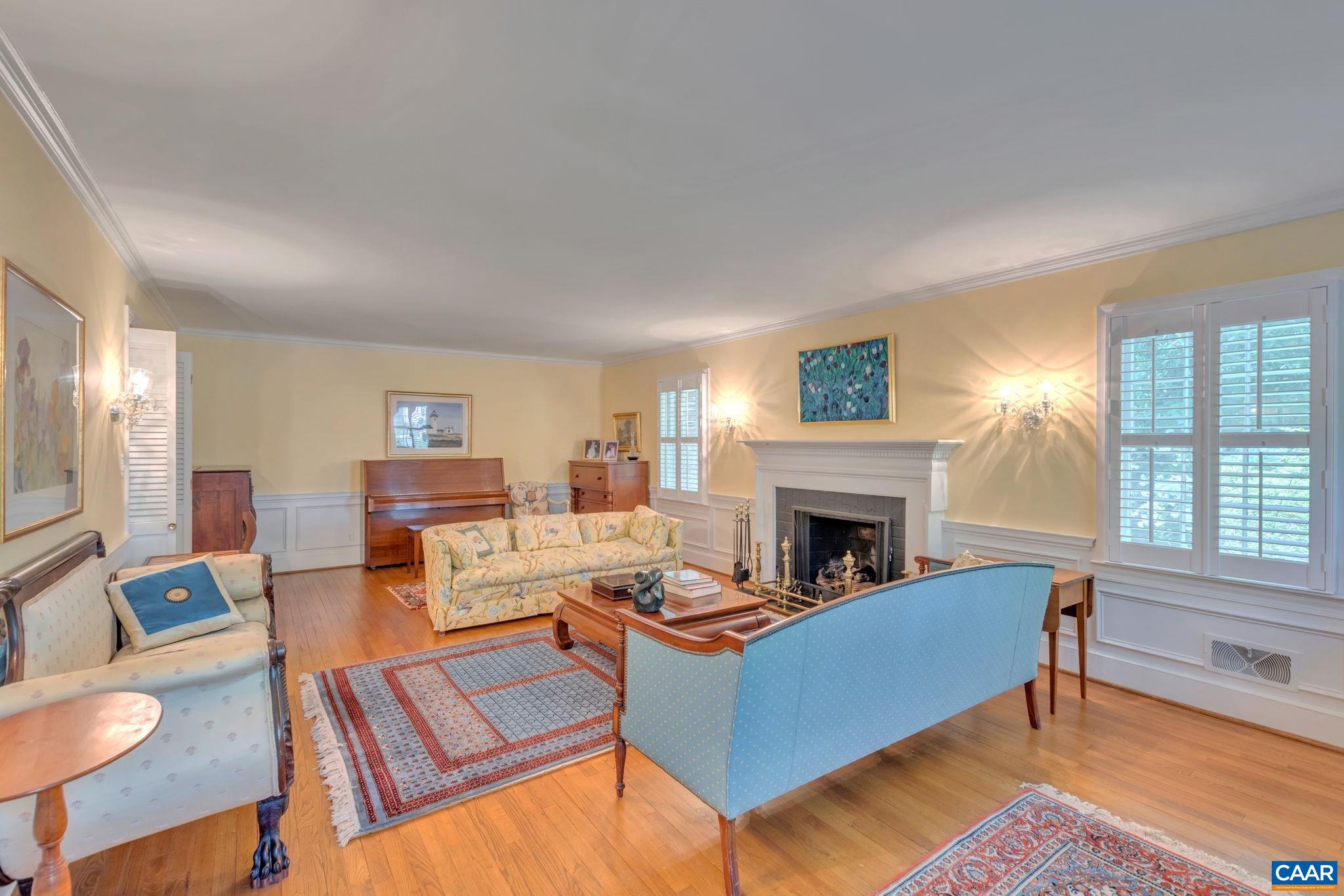 1440 Grove Road Charlottesville, VA 22901 - Photo 10 of 72 a living room with furniture fireplace and window