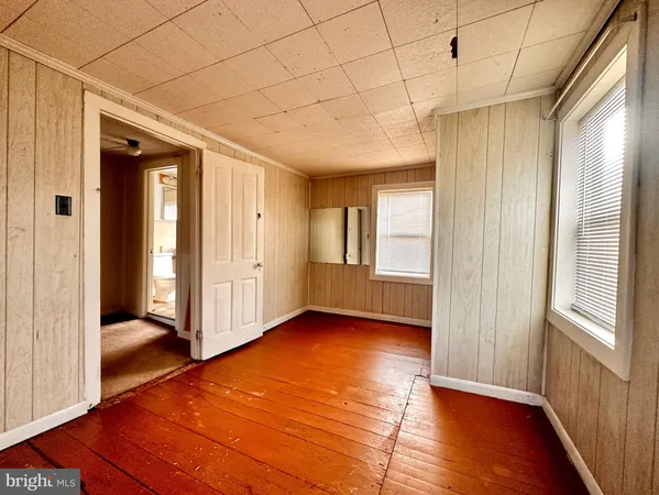 a view of livingroom with hardwood floor and window