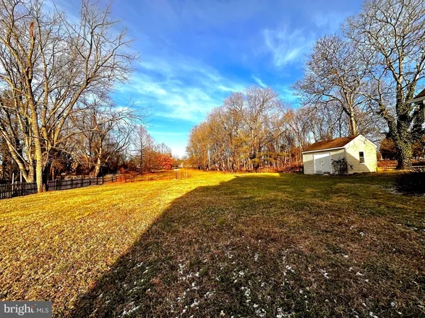 a view of an ocean with a yard