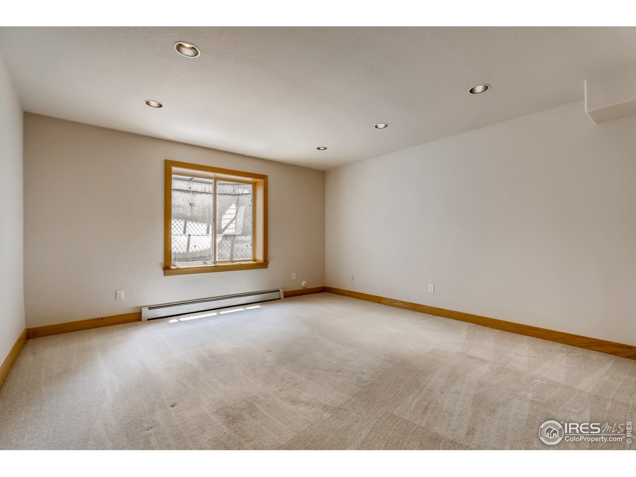 566 Dakota Boulevard Boulder, CO 80304 - Photo 20 of 24 a view of an empty room with a window