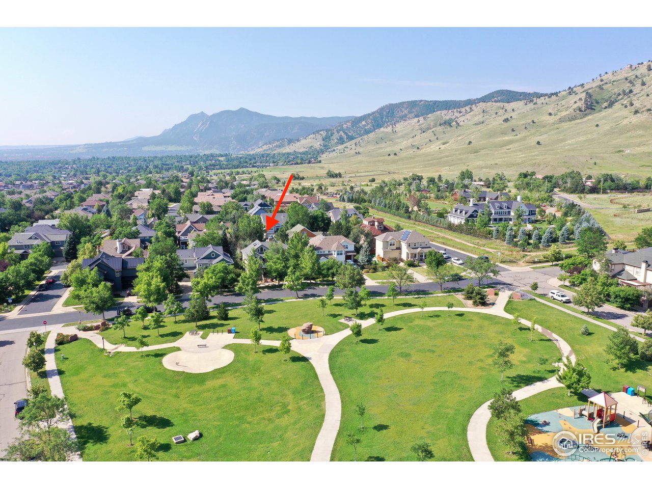 566 Dakota Boulevard Boulder, CO 80304 - Photo 23 of 24 a view of a city with mountains in the background