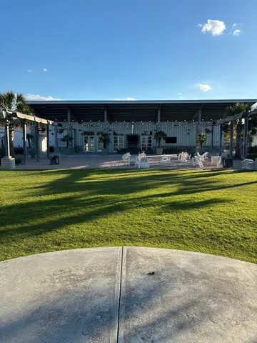 a view of a house with a big yard