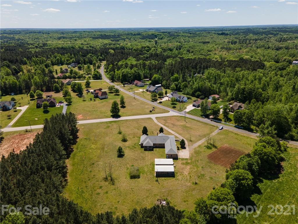 3292 Harmony Road Catawba, SC 29704 - Photo 20 of 20 a view of a lake with a city
