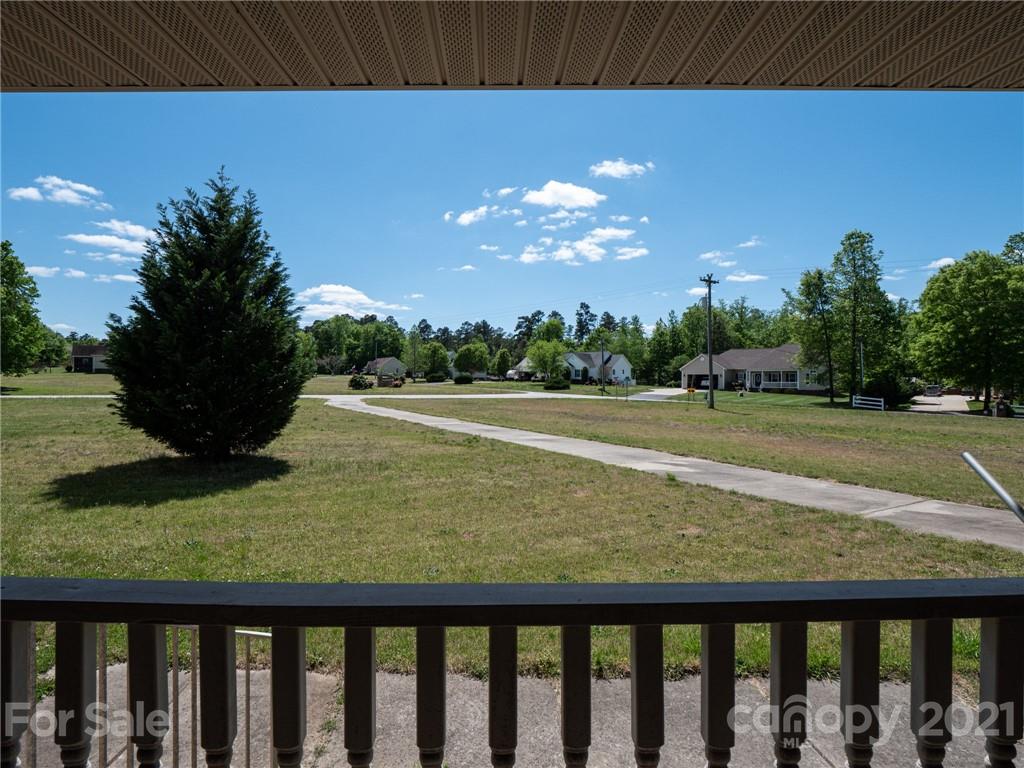 3292 Harmony Road Catawba, SC 29704 - Photo 7 of 20 a view of a swimming pool with a yard
