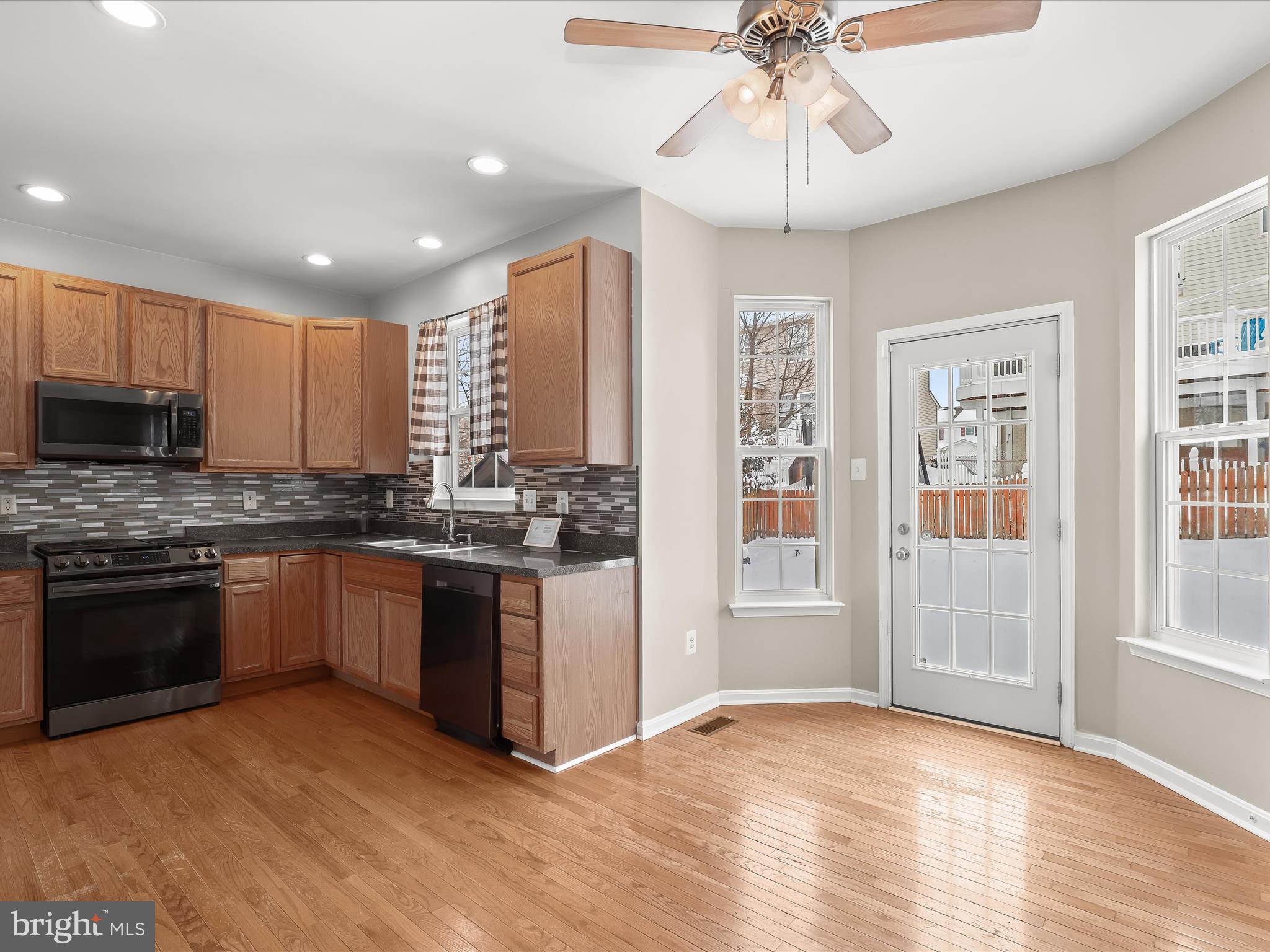 15 Dunmore Drive Hanover, PA 17331 - Photo 19 of 40 a kitchen with granite countertop stainless steel appliances and wooden floor