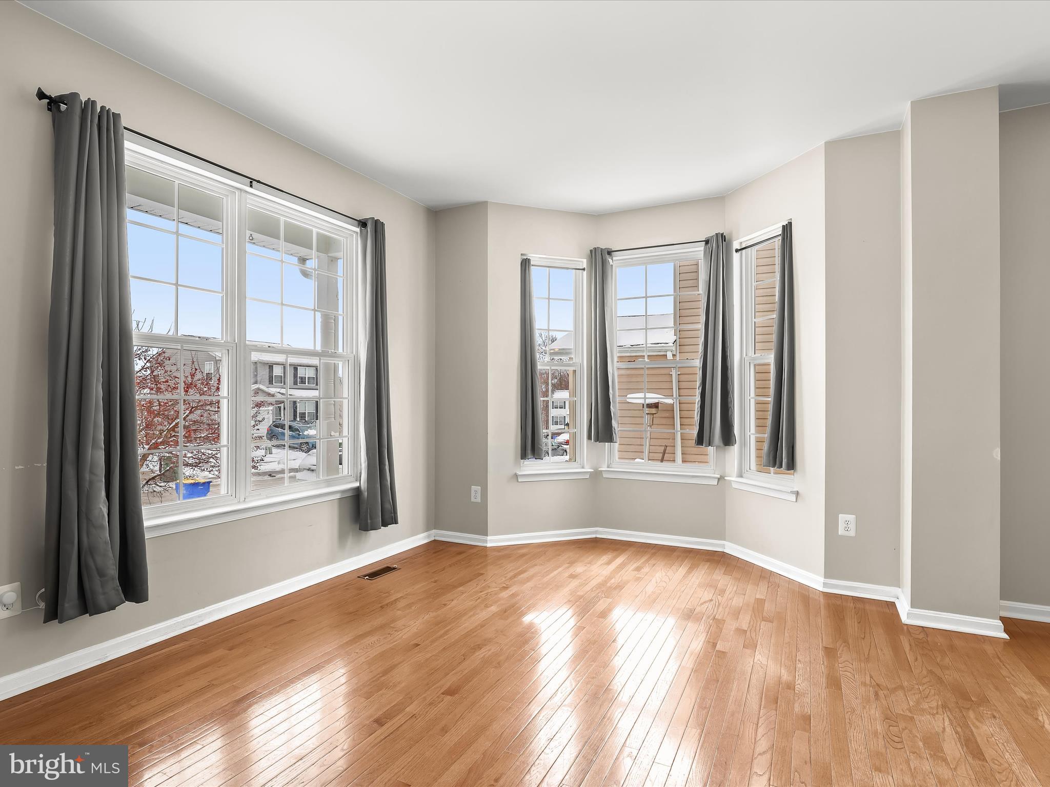 15 Dunmore Drive Hanover, PA 17331 - Photo 2 of 40 a view of an empty room with wooden floor and a window