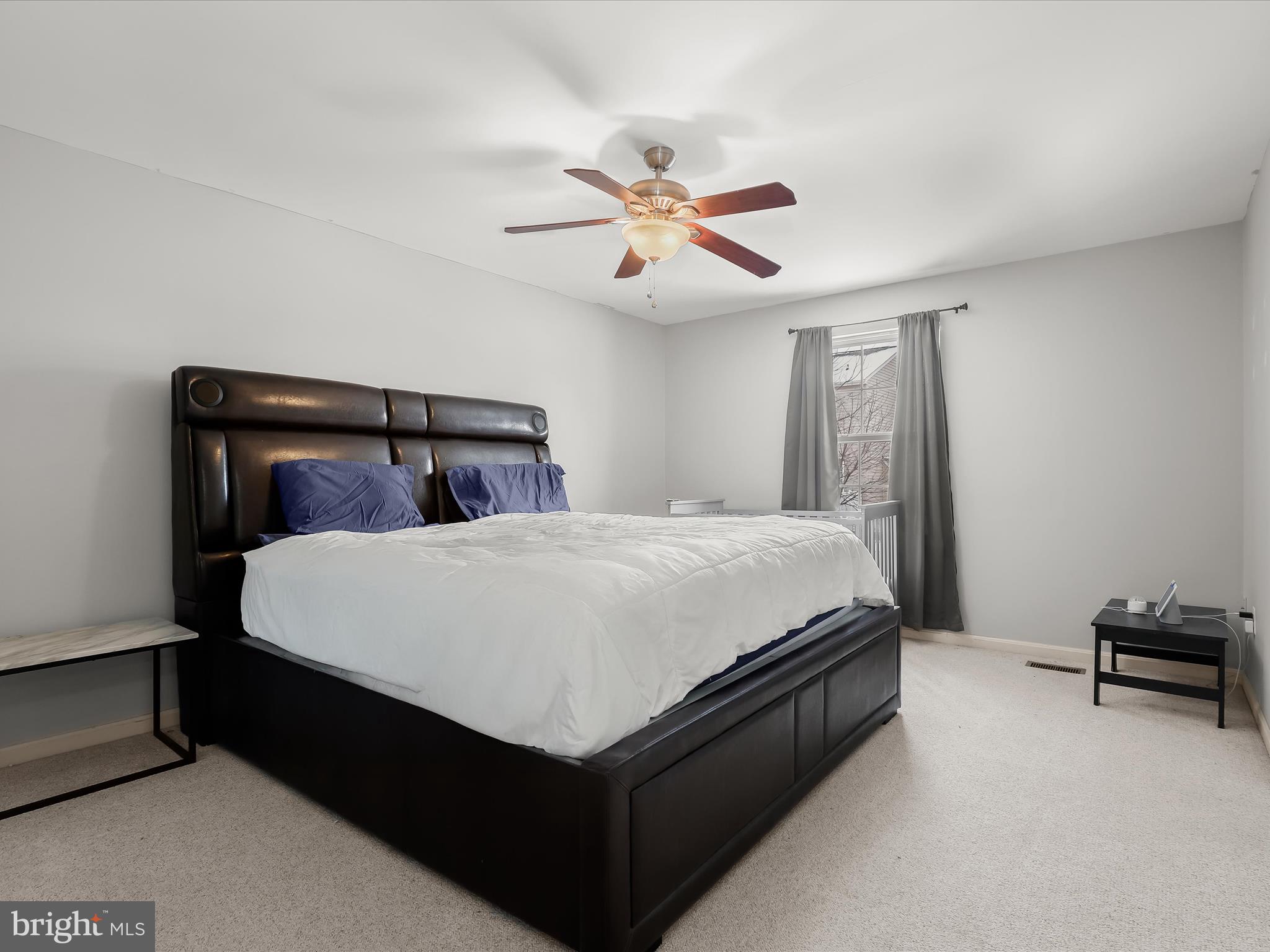 15 Dunmore Drive Hanover, PA 17331 - Photo 21 of 40 a bed sitting in a bedroom next to a window