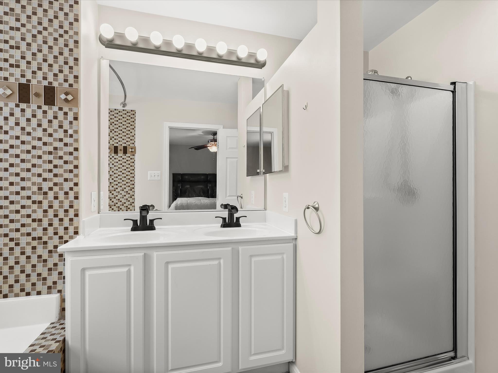 15 Dunmore Drive Hanover, PA 17331 - Photo 25 of 40 a bathroom with a double vanity sink mirror and shower