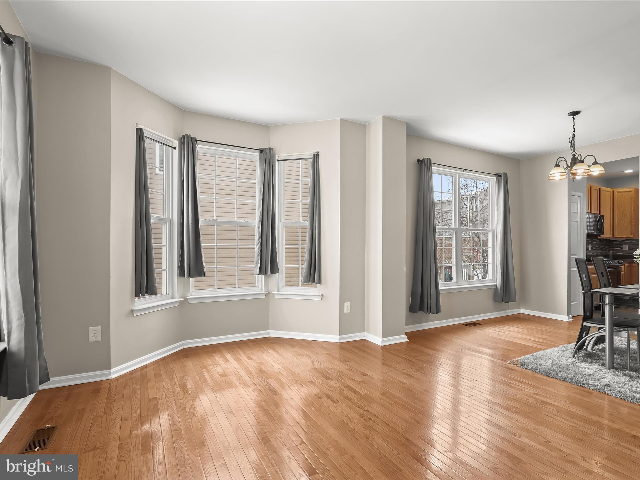15 Dunmore Drive Hanover, PA 17331 - Photo 3 of 40 a view of empty room with wooden floor and fan