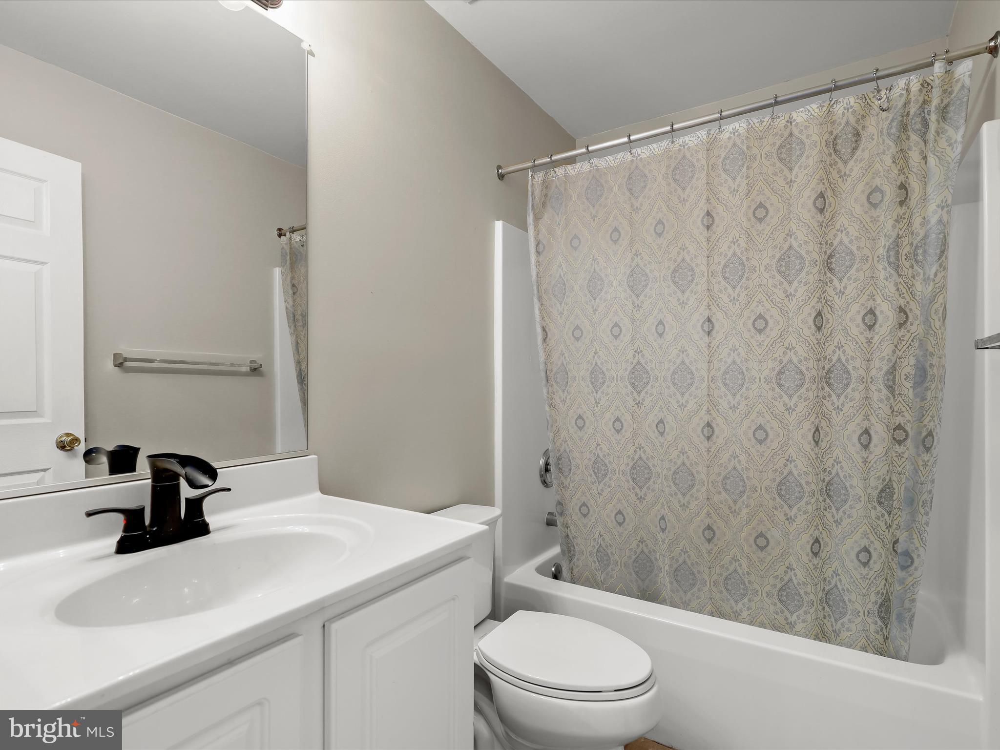 15 Dunmore Drive Hanover, PA 17331 - Photo 32 of 40 a bathroom with a sink a toilet and a shower