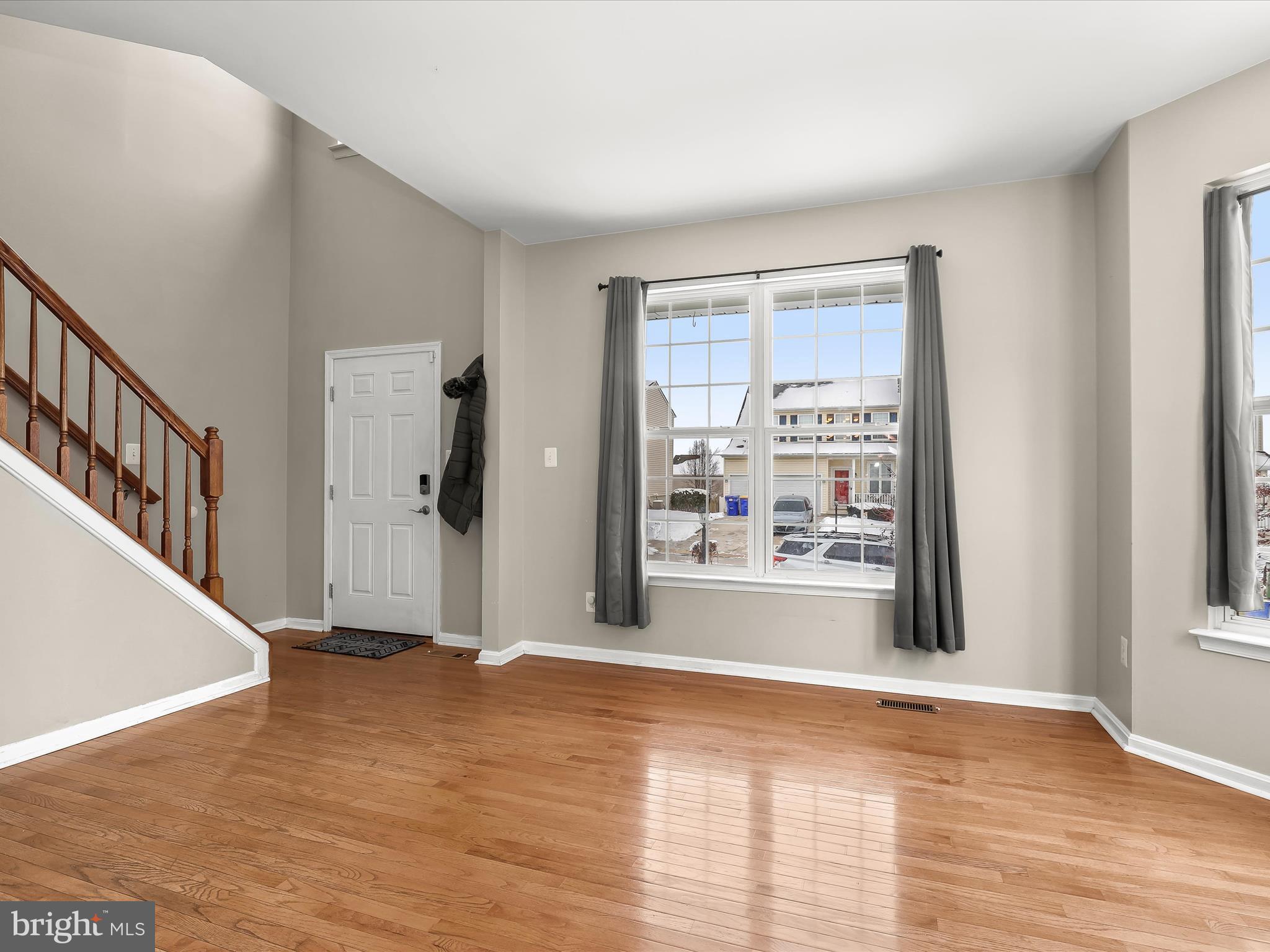 15 Dunmore Drive Hanover, PA 17331 - Photo 4 of 40 a view of an empty room with window and wooden floor