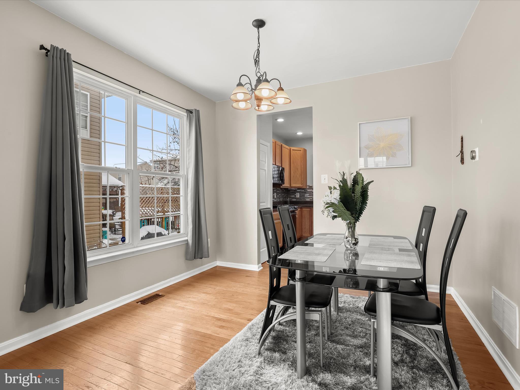 15 Dunmore Drive Hanover, PA 17331 - Photo 7 of 40 a view of a dining room with furniture window and wooden floor