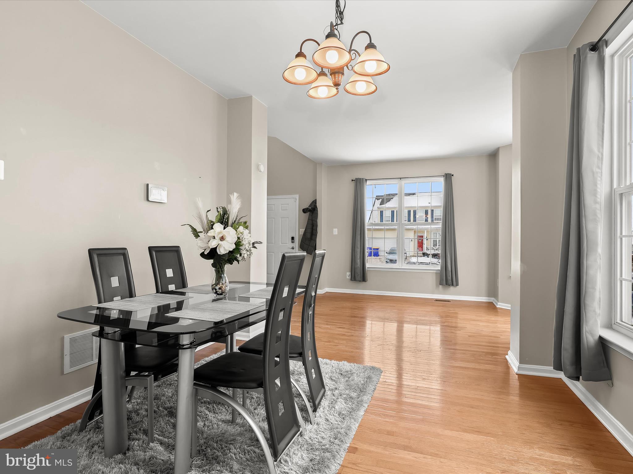 15 Dunmore Drive Hanover, PA 17331 - Photo 8 of 40 a view of a dining room with furniture wooden floor and a chandelier