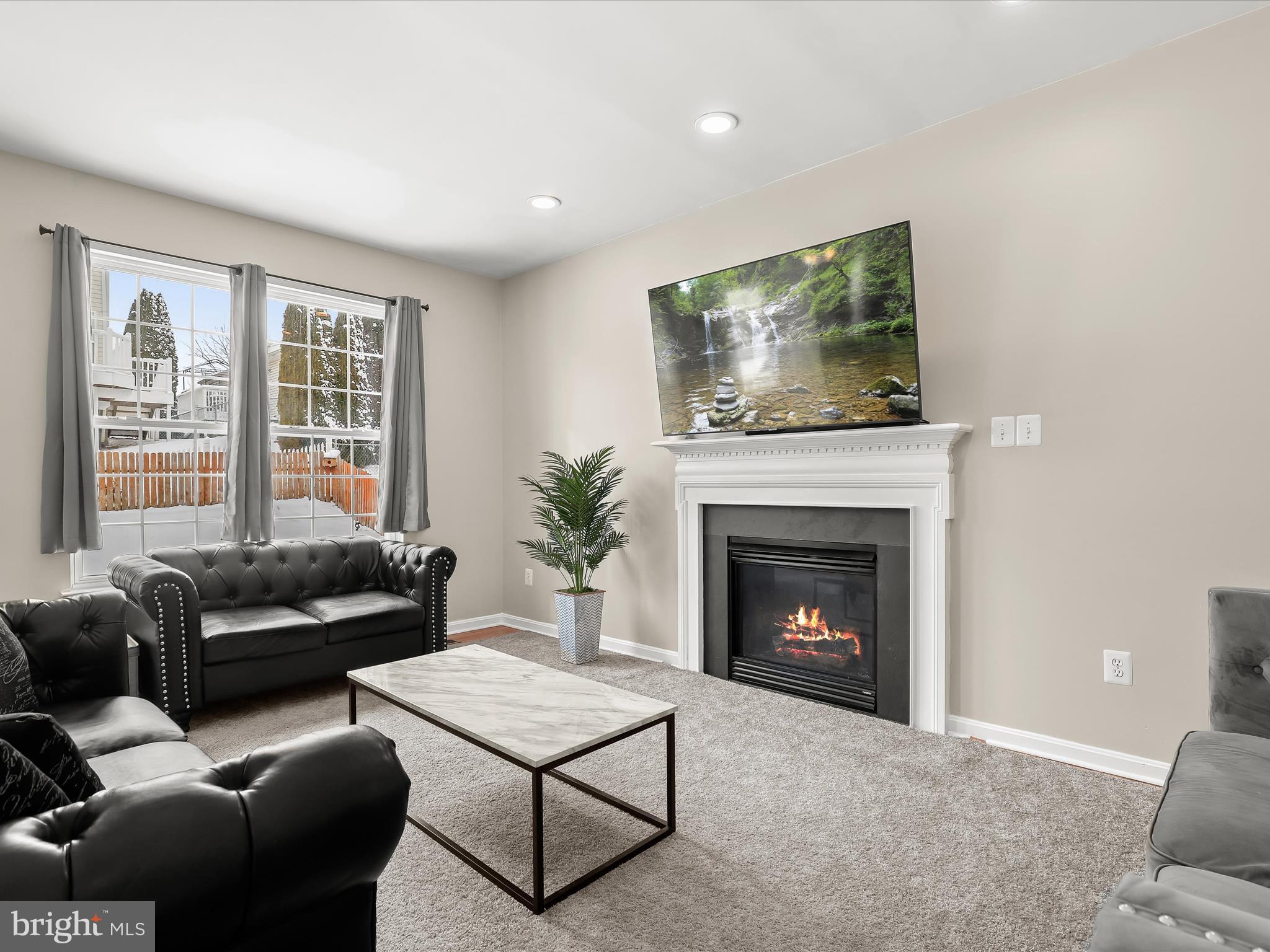 15 Dunmore Drive Hanover, PA 17331 - Photo 9 of 40 a living room with furniture and a fireplace