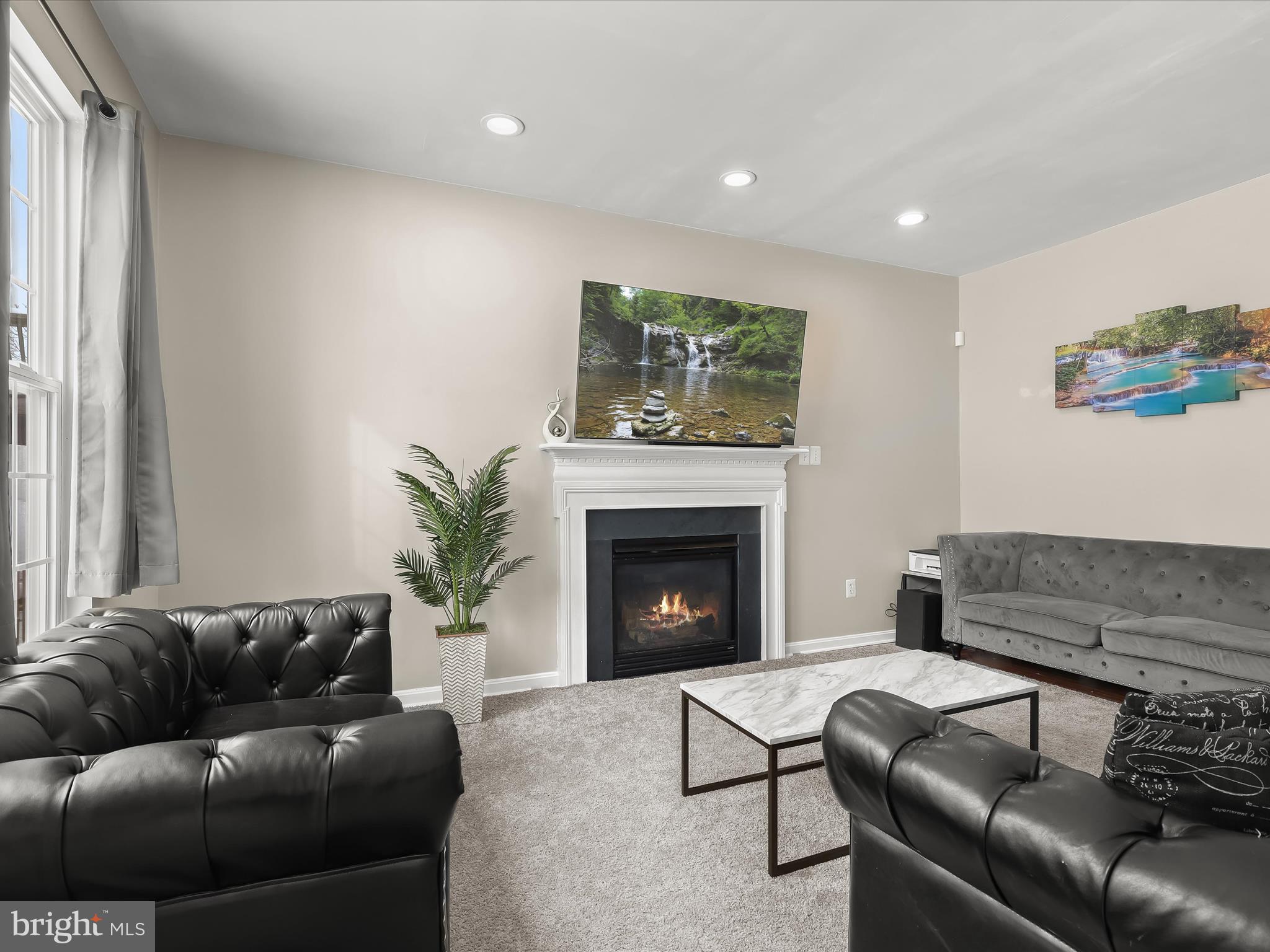 15 Dunmore Drive Hanover, PA 17331 - Photo 10 of 40 a living room with furniture and a fireplace