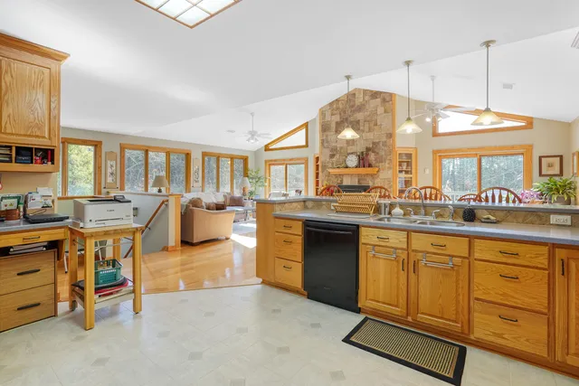 a bed room with a bed and dresser