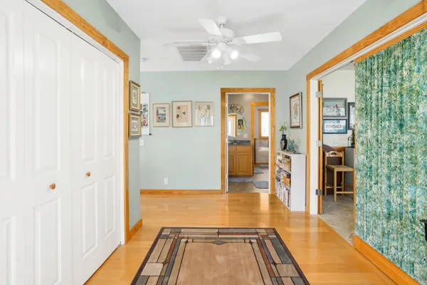 a bathroom with a tub a sink and a shower