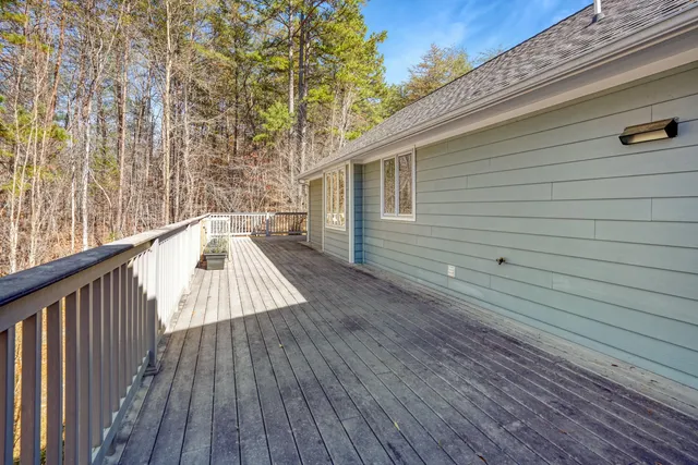 a view of a workspace with furniture