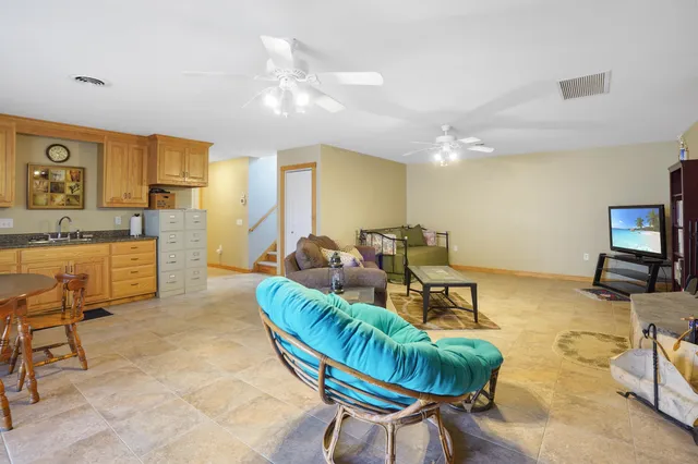 an aerial view of mountain with trees in the background