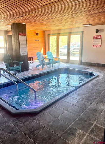 a view of a living room and dining room
