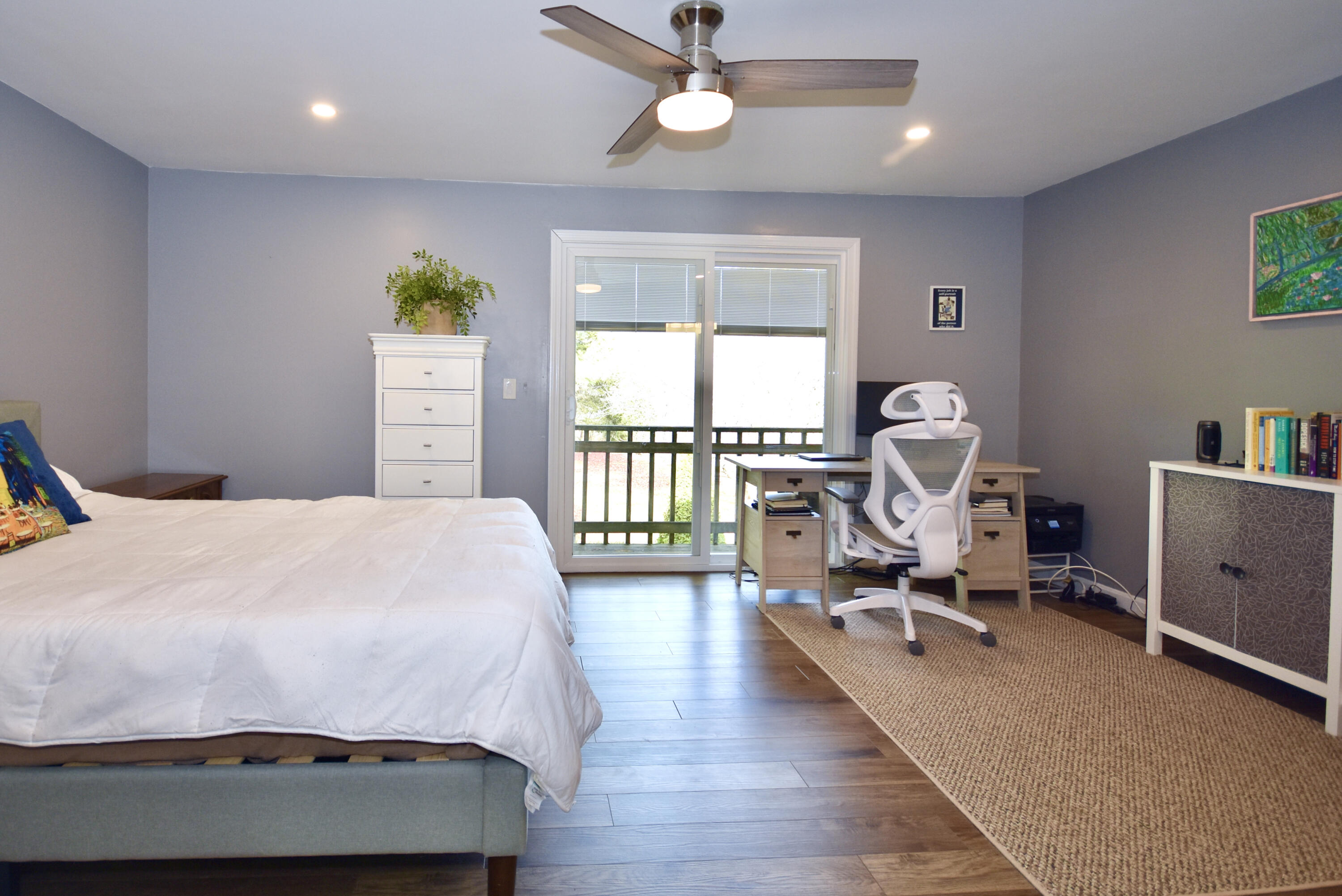 300 Buck Island Road, Unit 5D West Yarmouth, MA 02673 - Photo 13 of 22 a bedroom with a bed and wooden floor