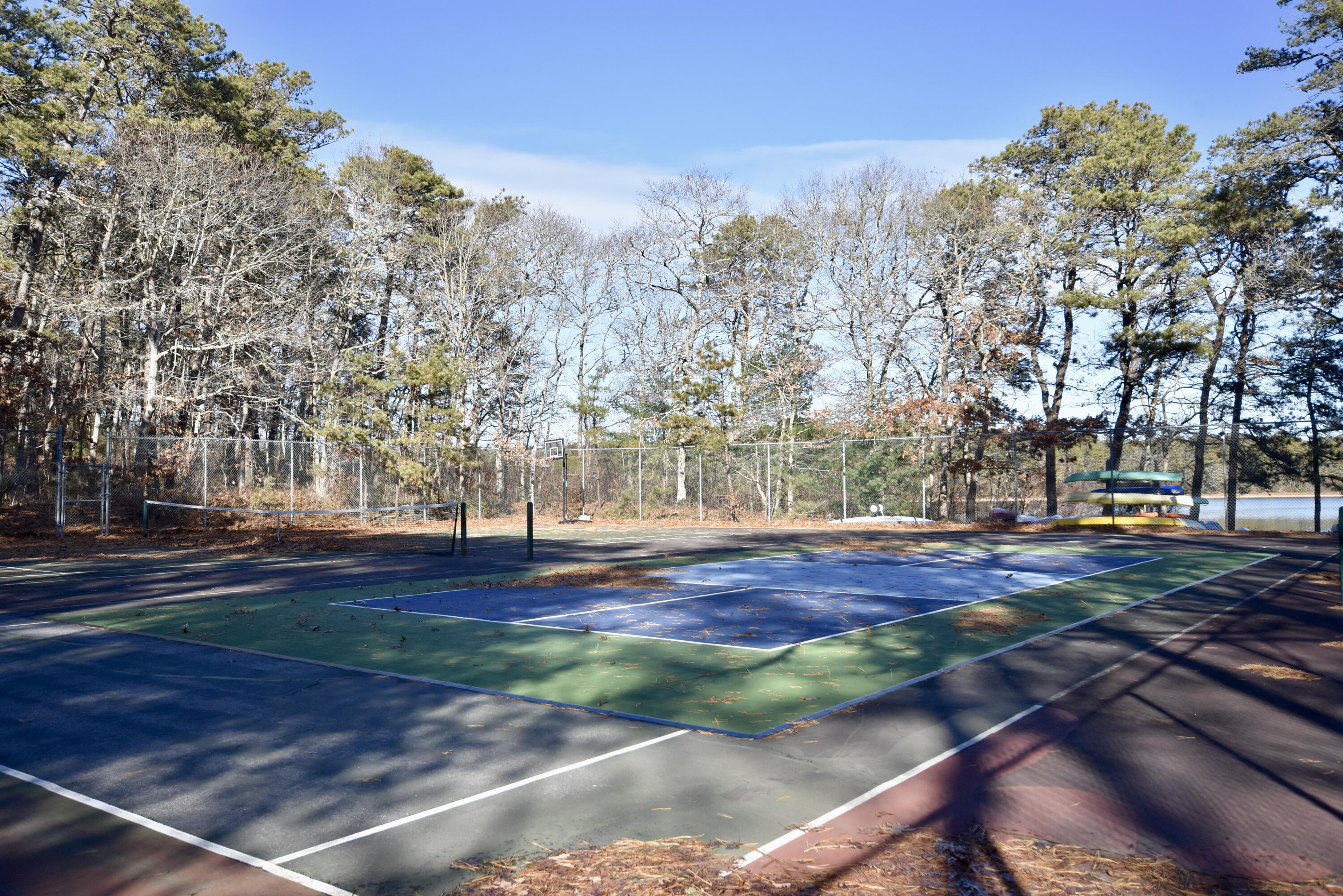 300 Buck Island Road, Unit 5D West Yarmouth, MA 02673 - Photo 21 of 22 a view of yard with tree and wooden fence