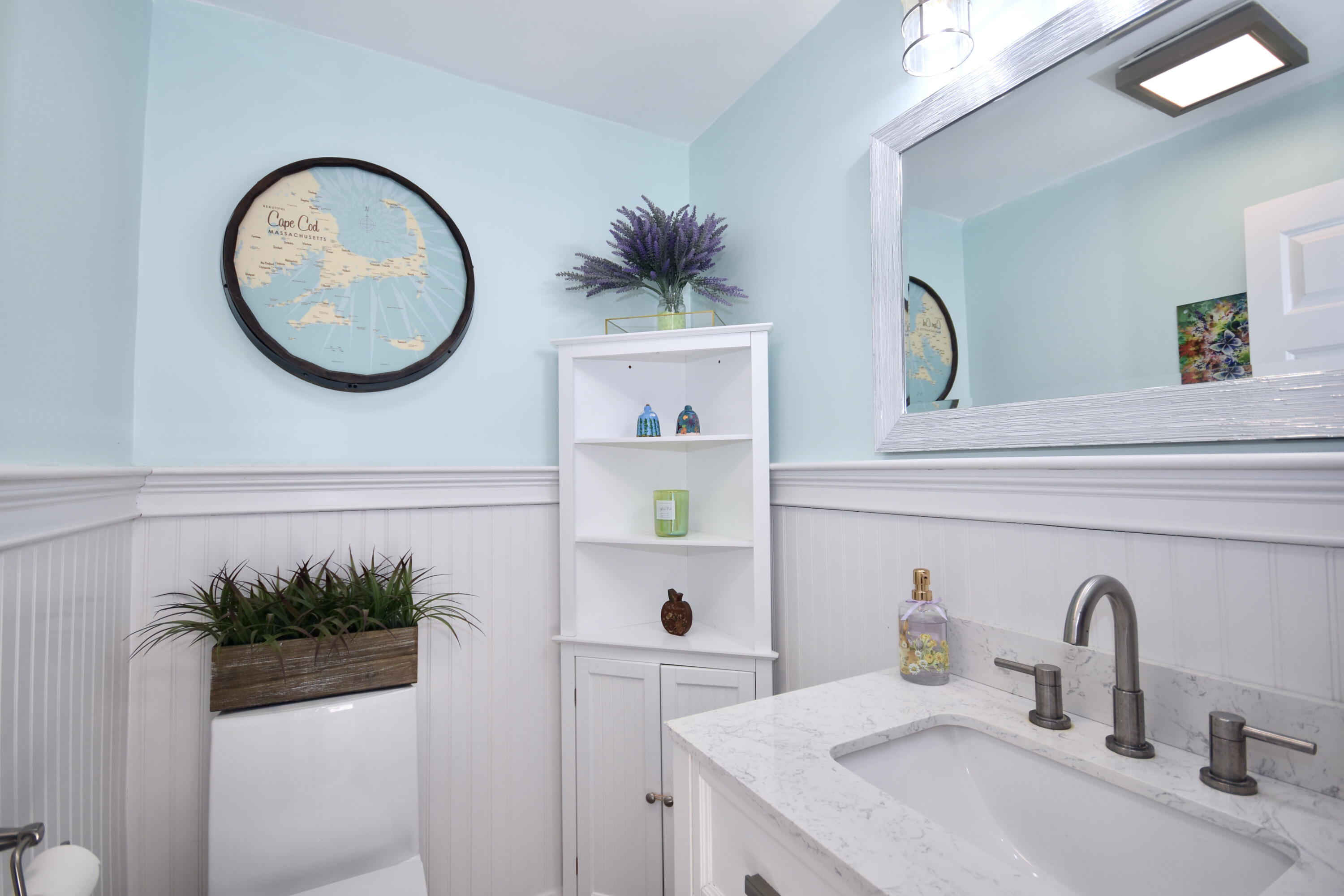 300 Buck Island Road, Unit 5D West Yarmouth, MA 02673 - Photo 9 of 22 a bathroom with a sink a mirror and a window