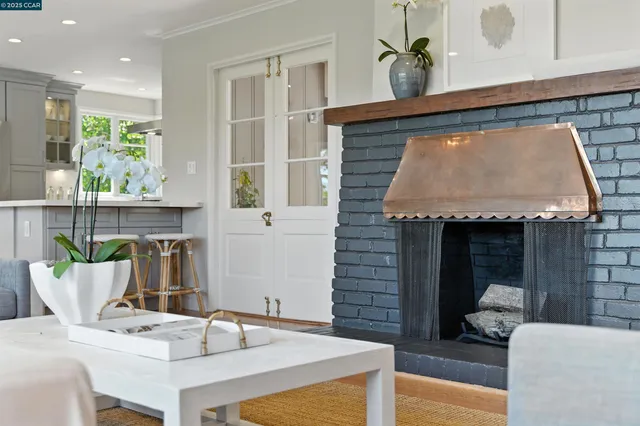 a kitchen with a table and chairs