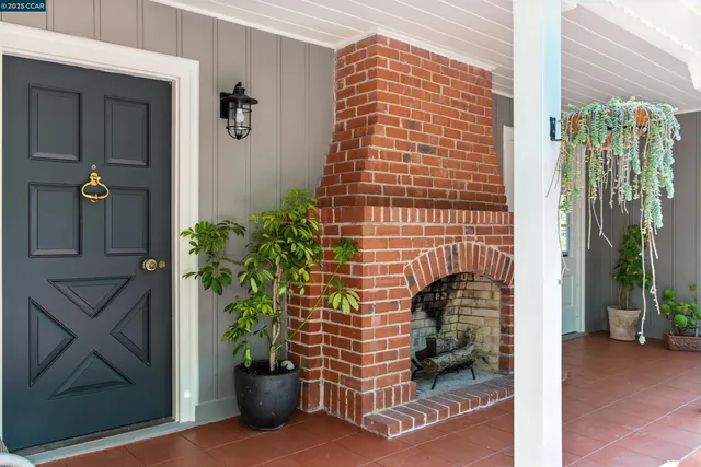 a view of a balcony with a potted plant