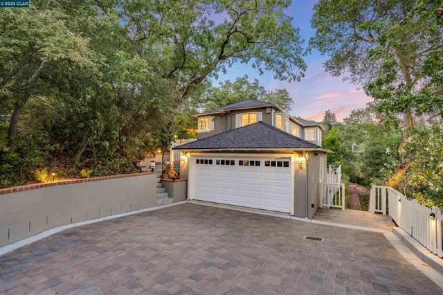 a view of an outdoor sitting area with furniture