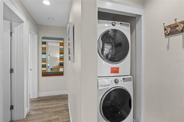 a room with window dryer and washer