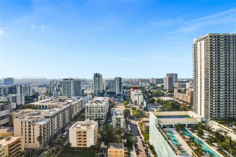 a view of city with tall buildings