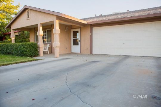 717 Ginger Avenue Ridgecrest, CA 93555 - Photo 3 of 28 front view of a house