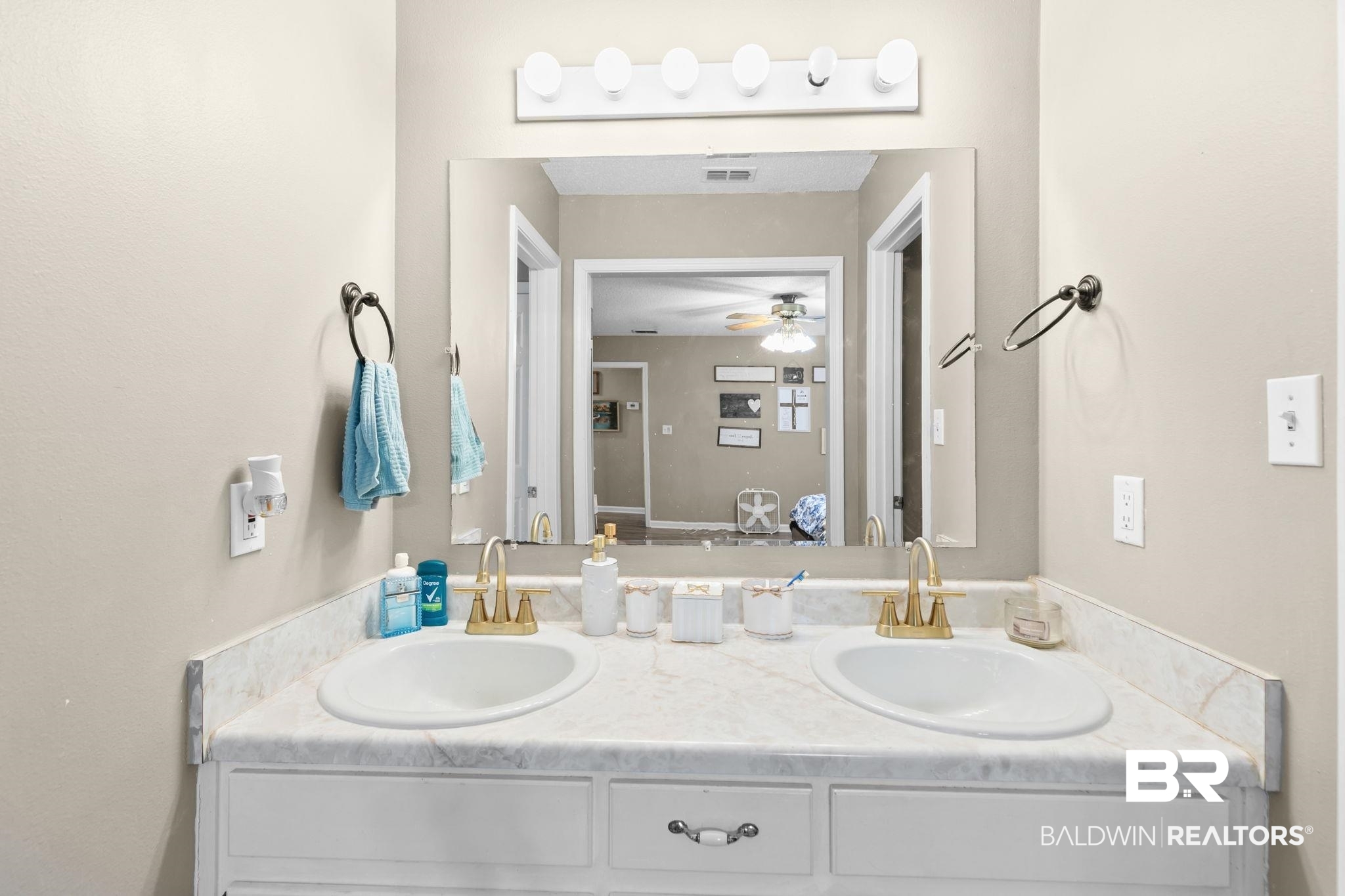 3842 Experiment Farm Road Monroeville, AL 36460 - Photo 36 of 59 Bathroom with double vanity and ceiling fan