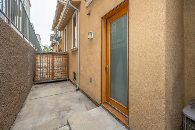 a view of parking garage with cars